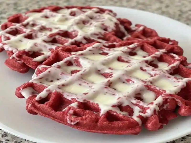 red velvet waffles with cream cheese glaze