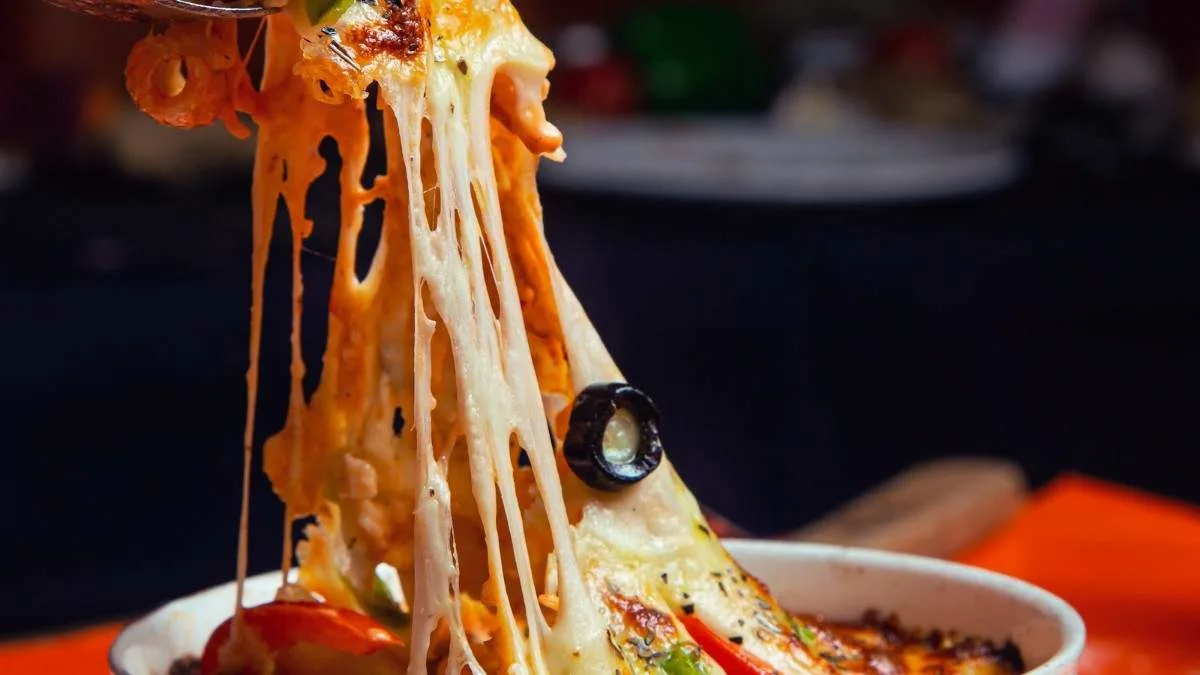 Cheesy chicken burrito bowl casserole with rice in a baking dish