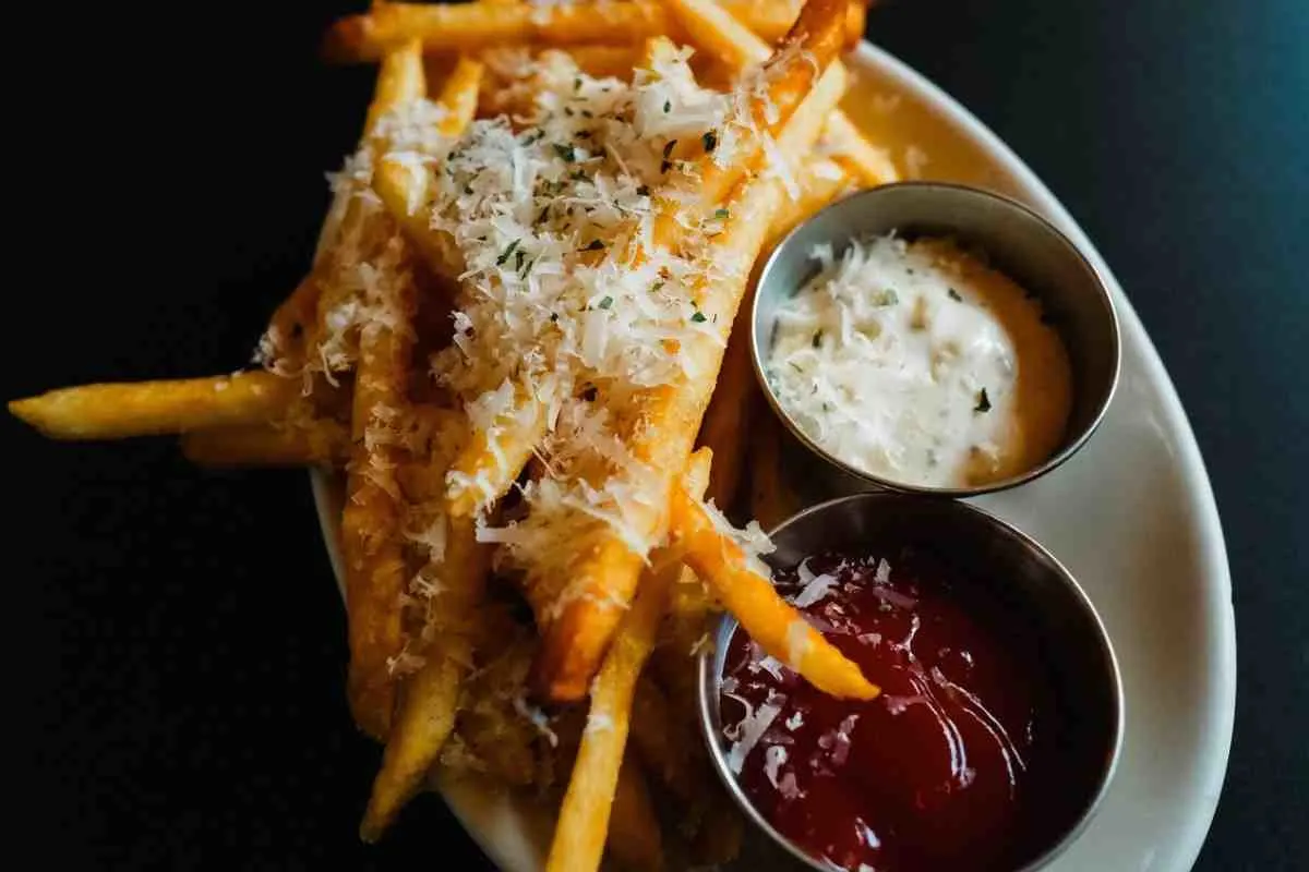 Loaded Voodoo fries served with cheese sauce and ranch dip