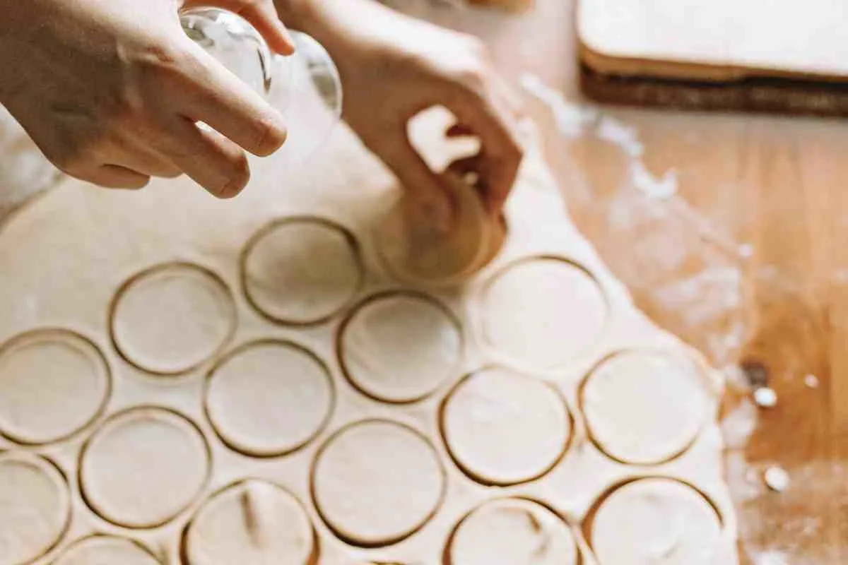 Cutting biscuit dough circles for chicken pot pie topping