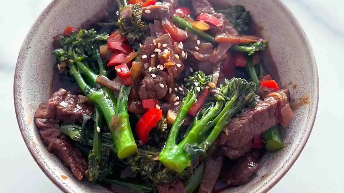 Healthy ground beef and broccoli slaw stir fry served in a bowl