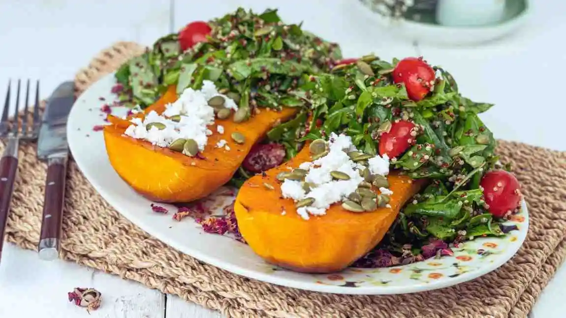 Healthy Mediterranean sweet potato boats loaded with fresh herbs and feta cheese