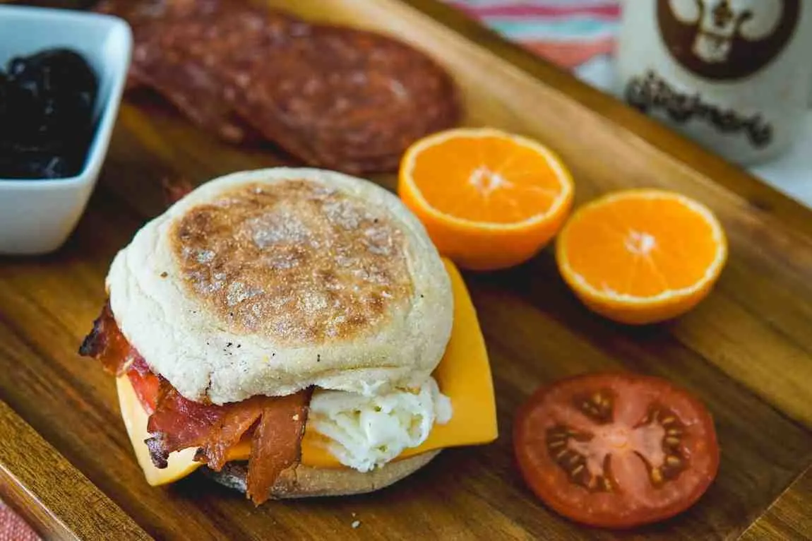 English muffin breakfast sandwich with egg cheese and sausage